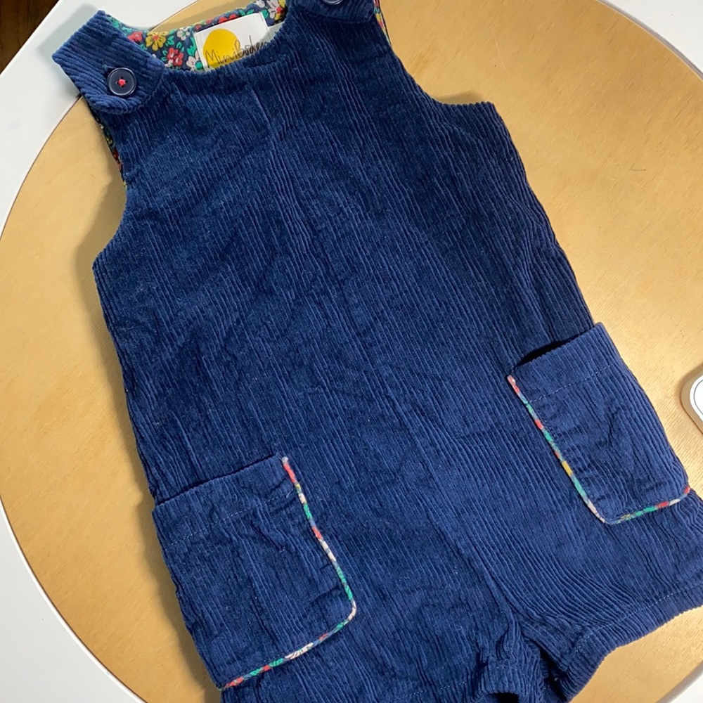 Mini Boden floral line corduroy romper with button straps